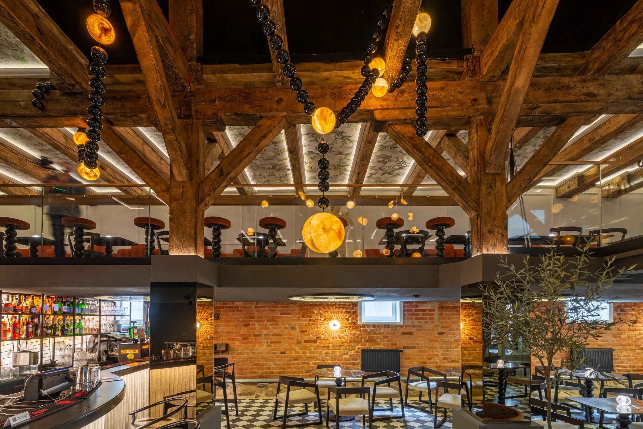 Restaurant interior showing upholstered seating and tables